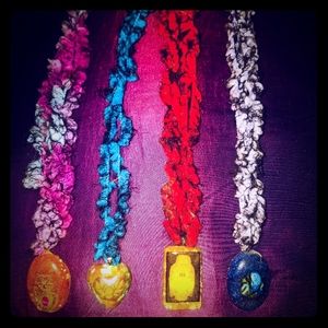 Handmade resin necklaces.